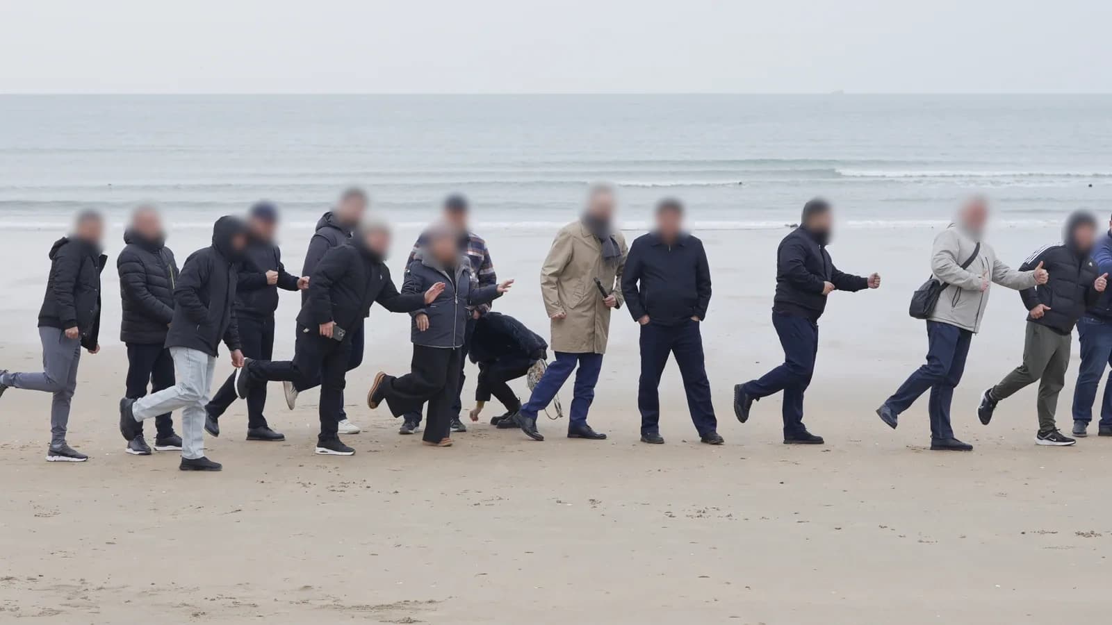 Cohort 2 partners gathered for a group photo at Eurwangri beach — the seaside excursion added after Cohort 1 feedback